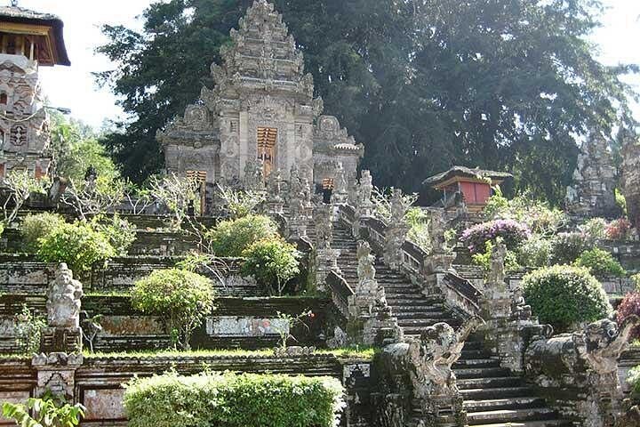 A Balinese candi bentar split gate and stone stairway at a temple in south Bali